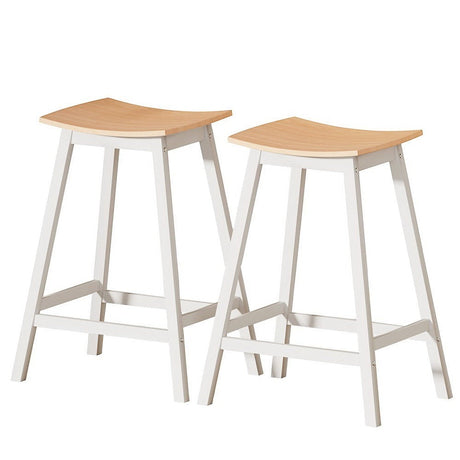 Edithvale oak wooden bar stool with saddle seat in a bright kitchen