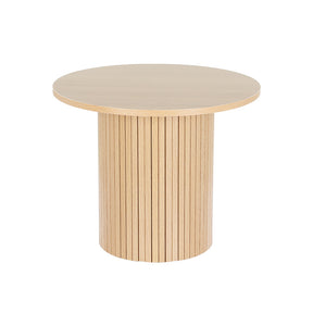 Buxton pine wood coffee table in a modern living room