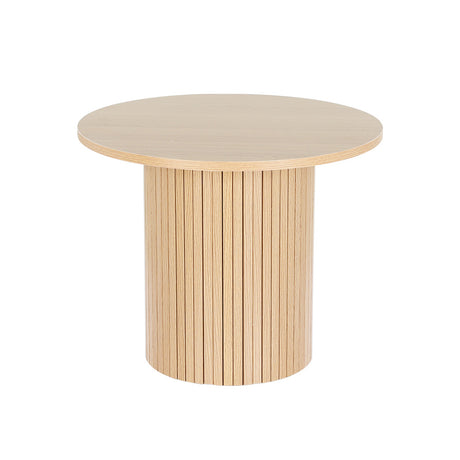 Buxton pine wood coffee table in a modern living room