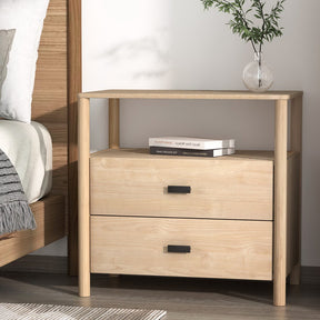 Cascais tall pine bedside table with two drawers and open shelf beside a bed
