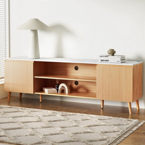Swansea 180cm white entertainment unit with marble effect top and pine wood legs in a modern living room