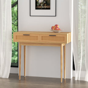 Kolding rattan console table with woven drawers and eucalyptus legs in an entryway