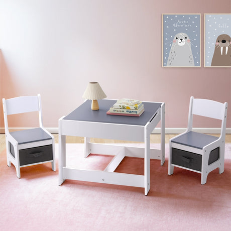 Kids table and two chairs set with chalkboard top and storage in white and grey
