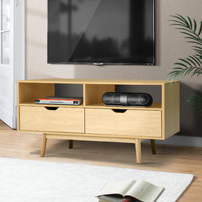 Somerset 120cm natural Scandinavian TV cabinet with tapered wood legs in a modern living room