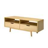 Somerset 120cm natural Scandinavian TV cabinet with tapered wood legs in a modern living room