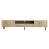 Woodbridge pine 200cm lowline entertainment unit with rubberwood legs in a modern living room