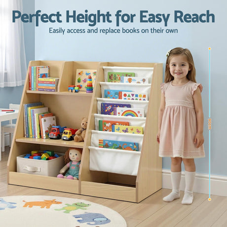 Wood finish kids bookshelf with fabric book slings, open shelves and a storage drawer