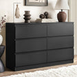 Sienna white and black 6 drawer lowboy with groove handle in a modern bedroom