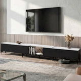 Wynyard black extendable TV entertainment unit with four drawers and marble effect top in a living room