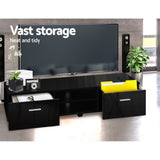 Dover black 140cm high gloss entertainment unit with two drawers in a modern living room