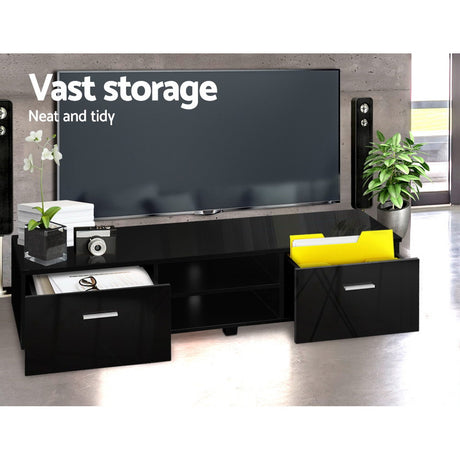 Dover black 140cm high gloss entertainment unit with two drawers in a modern living room