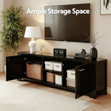 Snug black 160cm entertainment unit with cabinets and shelves in a modern living room