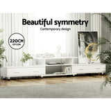 Bicheno white extendable three in one entertainment unit with four drawers in a modern living room