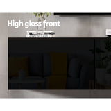 Burnie 200cm black high gloss floating wall mounted entertainment unit in a modern living room