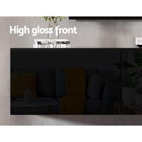 Burnie 200cm black high gloss floating wall mounted entertainment unit in a modern living room