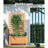 Raised garden bed with trellis used on a porch with potted plants