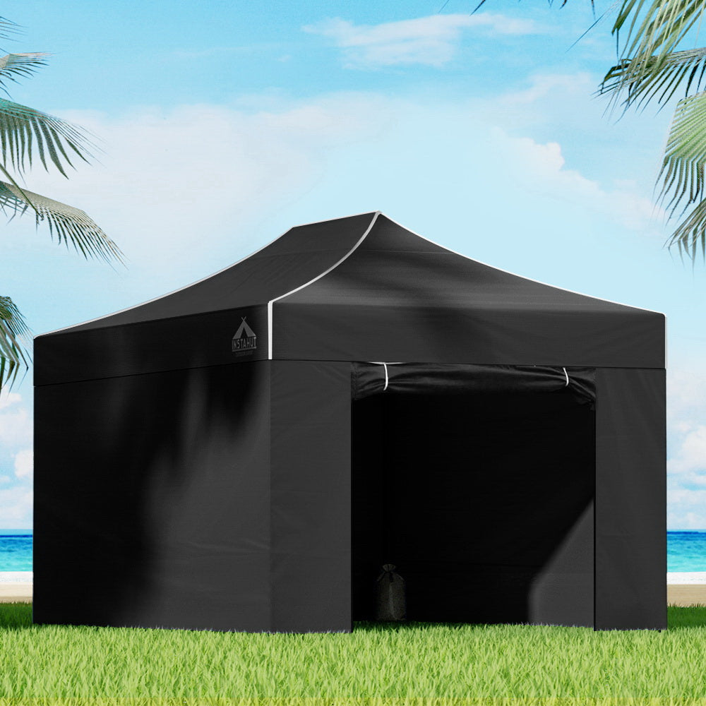 Black 4.5 x 3 m pop up gazebo fully enclosed with all side walls fitted