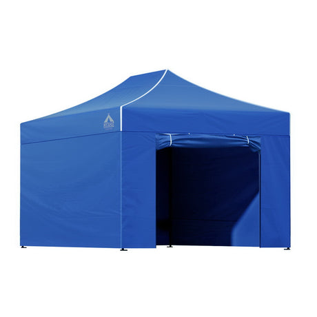 Blue gazebo folded down beside its oxford weave wheeled carry bag