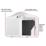 White folding marquee with side walls fitted and roll up door panel open
