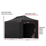Black folding marquee with side walls fitted and the door panel open