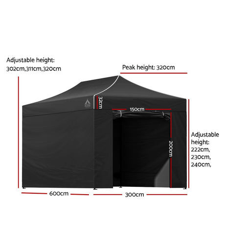 Black folding marquee with side walls fitted and the door panel open