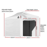 White folding marquee tent with side walls rolled open showing the space inside