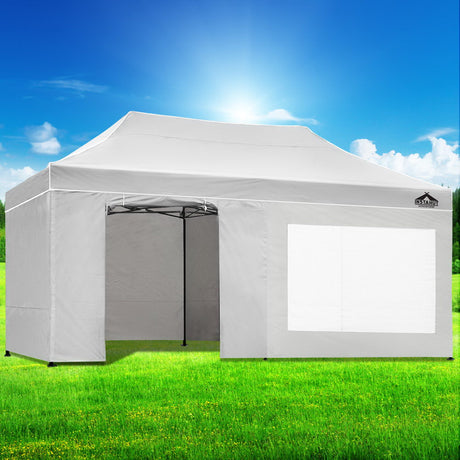 Oxford weave carry bag holding the folded white gazebo and its wall panels