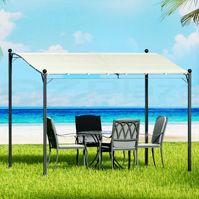 Beige 312 x 260 cm iron art gazebo with decorative steel frame in a garden