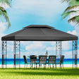Grey 4 x 3 m iron art gazebo with ornate steel frame in a garden