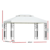 Angled view of the white 4 x 3 m iron art gazebo and its canopy