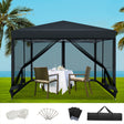 Black 3 x 3 m pop up gazebo with mesh side walls set up on grass