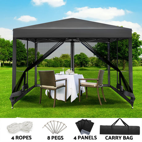 Grey 3 x 3 m pop up gazebo set up on grass with all four mesh walls zipped closed