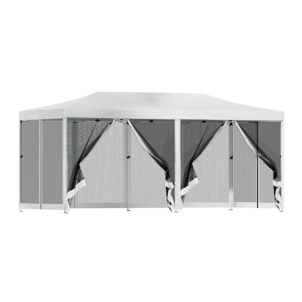 Folded gazebo frame packed into its black carry bag with pegs and ropes