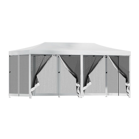 Folded gazebo frame packed into its black carry bag with pegs and ropes