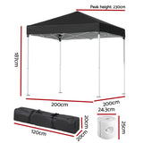 Side view of the black folding marquee tent with base pods fitted