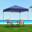 Blue 2 x 2 m pop up gazebo with four white base pods fitted to the legs