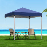 Blue 2 x 2 m pop up gazebo with four white base pods fitted to the legs