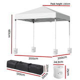 Side view of the white folding marquee tent with base pods fitted
