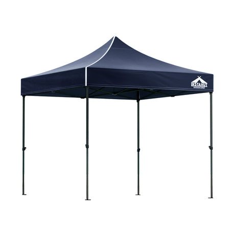 Navy pop up gazebo shown providing shade at an outdoor event