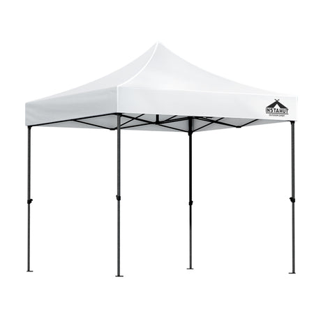 White pop up gazebo shown providing shade at an outdoor event