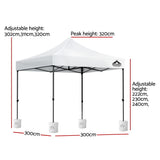 Angled view of the white gazebo showing the powder coated steel frame and legs