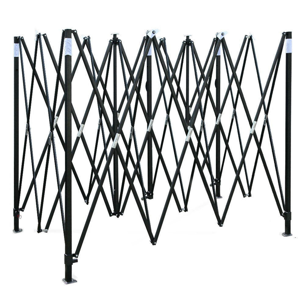 Cross bar steel frame and roof beams seen from underneath the white gazebo