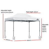Angled view of the white gazebo showing the powder coated steel frame and legs