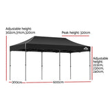 Long black folding marquee tent shown from the side with its peaked canopy
