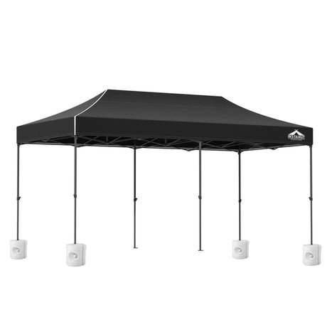 Long black folding marquee tent shown from the side with its peaked canopy
