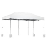 Long white folding marquee tent shown from the side with its peaked canopy