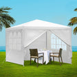 White 3 x 3 m gazebo with four side walls fitted, set up on grass