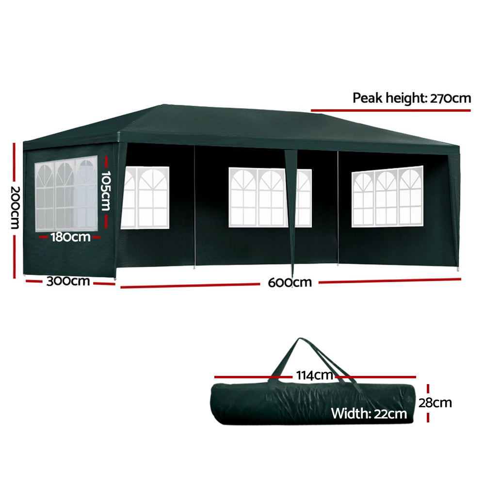 Green gazebo with side panels removed showing the open sheltered interior
