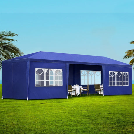 Blue 3 x 9 m marquee gazebo with eight side wall panels fitted