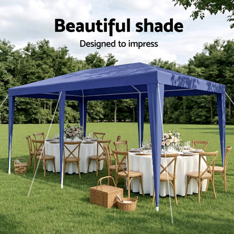 Underside of the blue gazebo canopy showing the steel roof framework